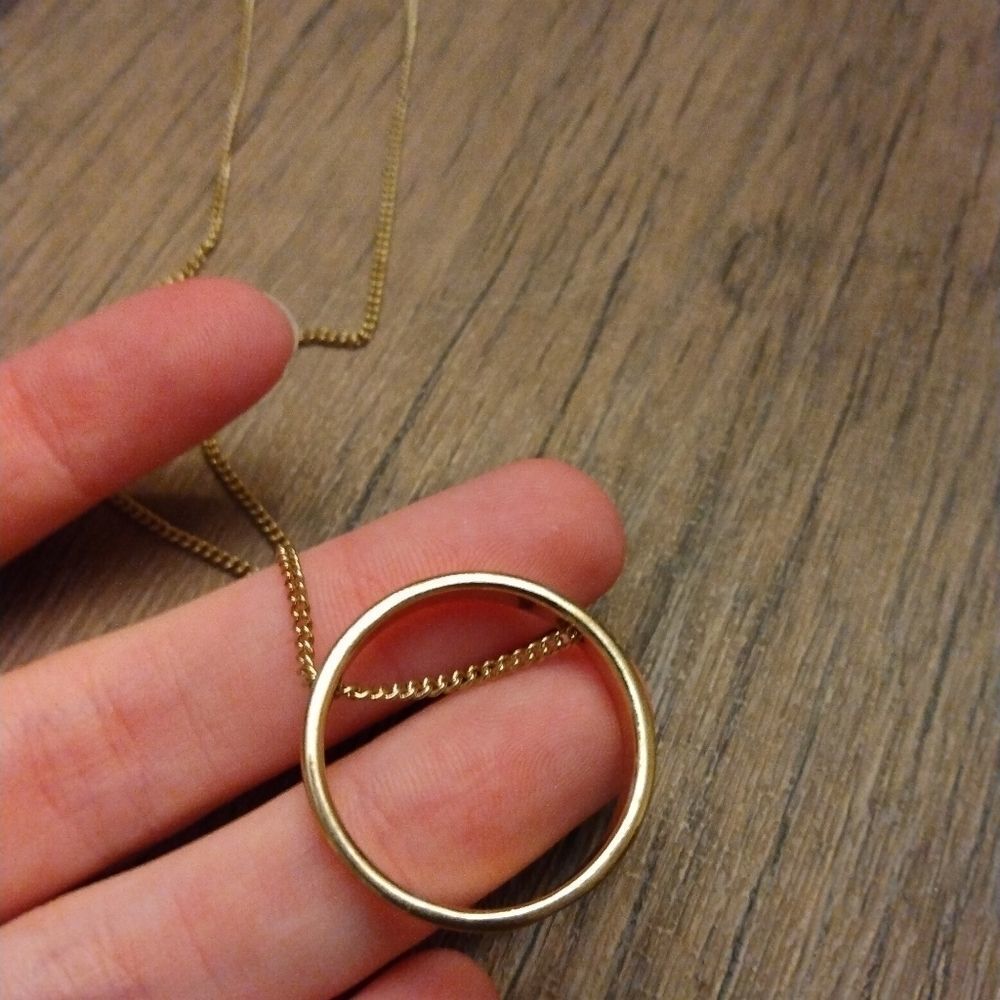 Infinity gold tone Necklace ring‎ new with tags